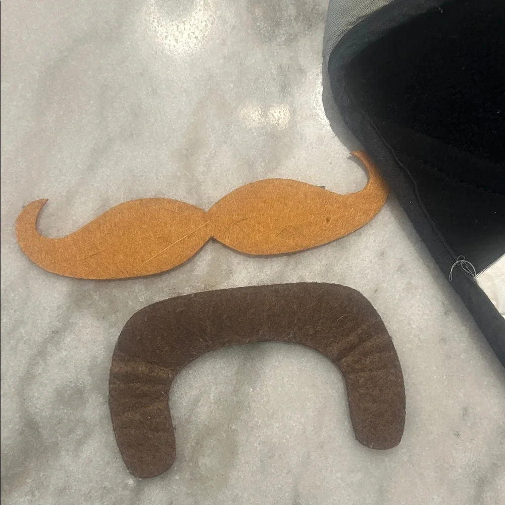 Snow boarding face mask with interchangeable mustaches